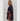 Model wearing black Krewer Dress with puff sleeves and relaxed mini silhouette.