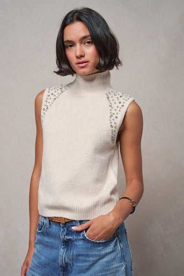Front view of the Boon sleeveless knit top in ivory featuring crystal shoulder detailing and a mock neckline.