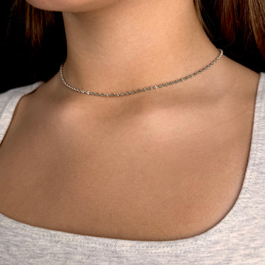Model wearing Bruma Necklace by Matte, silver twisted rope chain necklace, 16 inch