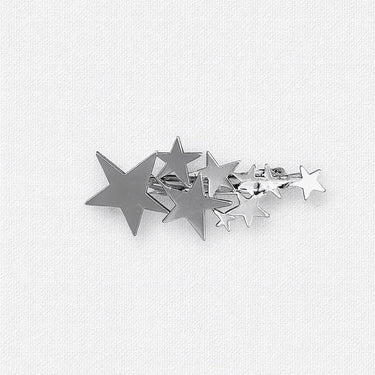 Bryn Hair Clip with silver star cluster design on white background, celestial accessory photo for Matte.