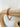 Calyn chunky gold chain bracelet on wooden display – Matte jewelry