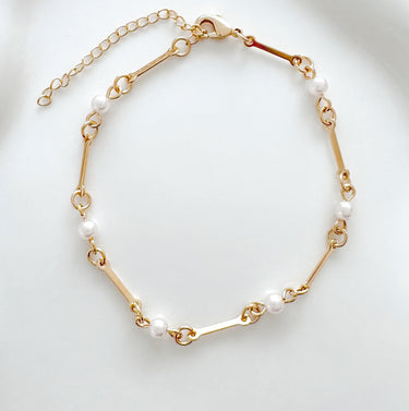 Gold chain Calypsa Bracelet with delicate pearl accents by Matte