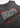 Rockstar Graphic Tee — black washed KISS tour graphic t-shirt with red lips print, sleeveless cut, laid flat and modeled for an edgy vintage look.