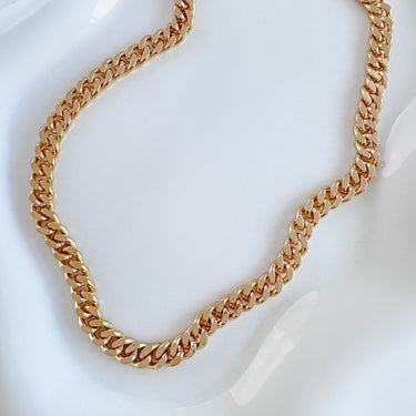 Cocothy necklace by Matte, gold plated chunky Cuban chain on white background