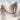 Dalia necklace gold plated heart charm chain on textured beige background