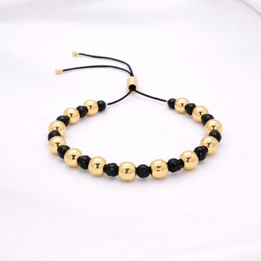 Darcity Beaded Bracelet black and gold beaded bracelet variation with adjustable closure close-up highlighting contrast beads and minimalist design.