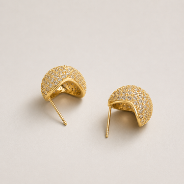 Delhi Stud Earrings gold pavé sphere stud earrings with textured crystal surface and sculptural silhouette.