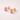 Embro Stud Earrings pink pear cut zirconia gold stud earrings.