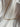 Encanto gold plated chain necklace by Matte, delicate flat chain on neutral fabric
