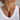 Model wearing the Estrid Necklace with its long brown cord and amber-tone statement pendant.