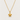Exuma Necklace featuring a polished gold-filled sea turtle pendant suspended from a delicate chain, styled on a light neutral background showcasing its timeless coastal-inspired design.