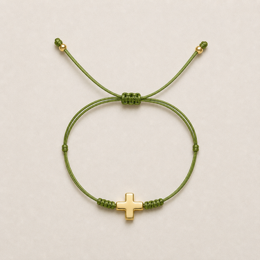 Faith Bracelet soft lime green adjustable cord bracelet with gold-tone cross charm.