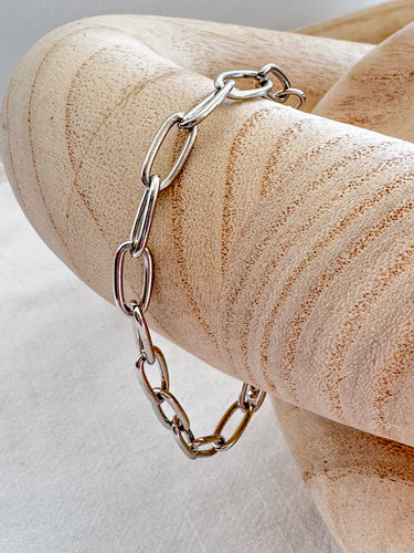 Silver Fatman Bracelet with bold chain links by Matte on wooden display