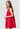 Side view of Gigi Dress showing A-line silhouette and lightweight cotton fabric.