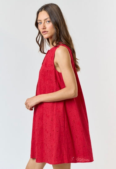 Side view of Gigi Dress showing A-line silhouette and lightweight cotton fabric.