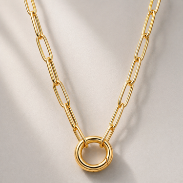 Inzu Necklace gold paperclip chain with circular clasp detail, polished 18k gold filled finish on neutral background.