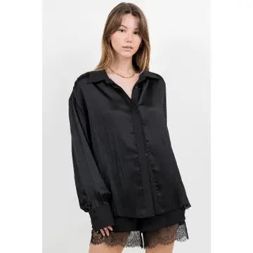 Three-quarter view of the Kayden relaxed black blouse.