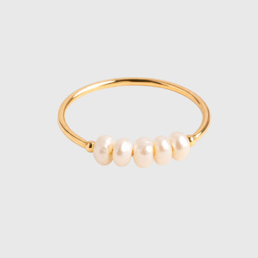 Close-up of Mathieu Ring highlighting small pearl accents and smooth polished finish