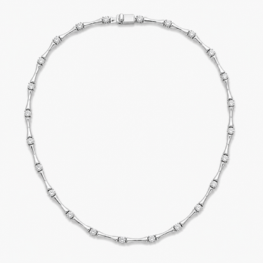 Lonet Necklace silver sculptural zirconia link necklace on neutral background.