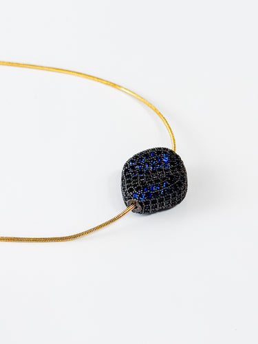 Luna Negra Pavé Necklace by Matte, gold chain with blue pavé gemstone bead