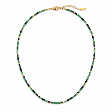 Lunne Necklace green beaded necklace with black accents and gold clasp on neutral background showing delicate strand design.