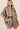 Front view of the Mara striped oversized blouse.