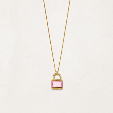 Marit Necklace in gold featuring a delicate chain and padlock pendant with a rectangular pink stone.