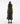 Back view of woman wearing long black hooded puffer vest with quilted design.