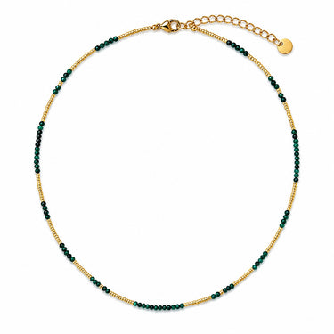 Meri Necklace green beaded necklace flat lay showing soft green beads, gold accents, and adjustable extender.