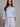 Moort linen shirt in light blue styled for everyday wear.
