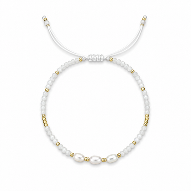 Morrath Bracelet in an ivory and pearl colorway featuring freshwater pearls, gold-tone accents, and an adjustable sliding cord closure.