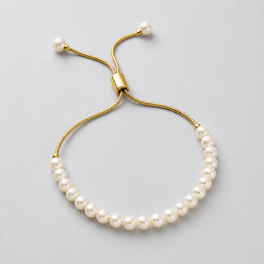 Mosin Pearl Bracelet in gold finish featuring delicate pearl detailing and adjustable sliding closure.