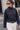 Murish Jacket dark-wash cropped denim jacket with stand collar and flap pockets.