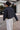 Murish Jacket dark-wash cropped jacket, back view.