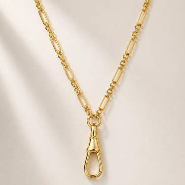 Nodal Necklace gold fine link chain necklace with front toggle clasp and elongated drop detail, designed with a polished 18k gold filled finish on a neutral background