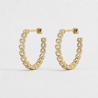 Noidy Hoop Earrings crystal-accented gold hoop earrings with sparkling stones and modern geometric silhouette.