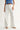 Relic Embroidered Denim Pants – white high-rise straight-leg jeans with embroidered detailing, front view on model.