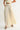 Roblen Pant soft cream wide-leg pants close-up of oversized pocket design and lightweight textured fabric.