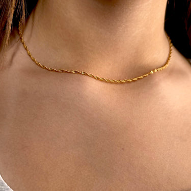 Model wearing Bruma Necklace by Matte, gold plated twisted rope chain necklace, 16 inch
