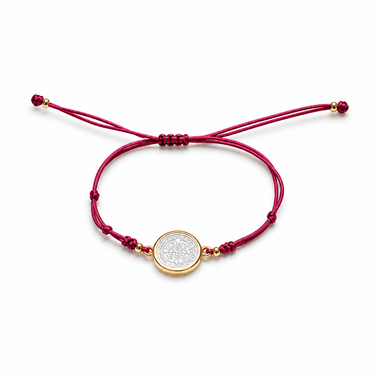 Saint Benedict Bracelet fuchsia cord adjustable bracelet with round gold-framed charm and minimal silhouette
