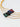 Starlight Pavé Necklace by Matte, gold plated chain with multicolor pavé gemstone pendant on white background