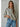 Talina lightweight grey knit cardigan with a relaxed silhouette, elbow-length sleeves, button-front closure, and rolled-edge trim, shown from the front.