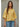 Talina lightweight mustard yellow knit cardigan with elbow-length sleeves, a relaxed silhouette, and button-front closure, shown from the front.