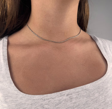 Model wearing Twine Necklace by Matte, silver twisted rope chain, 16 inch