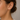 Model wearing Udhi 4 mm crystal stud earrings for a minimalist everyday look.