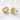 Gold twisted knot stud earrings on white linen backdrop, Vail Stud Earrings.