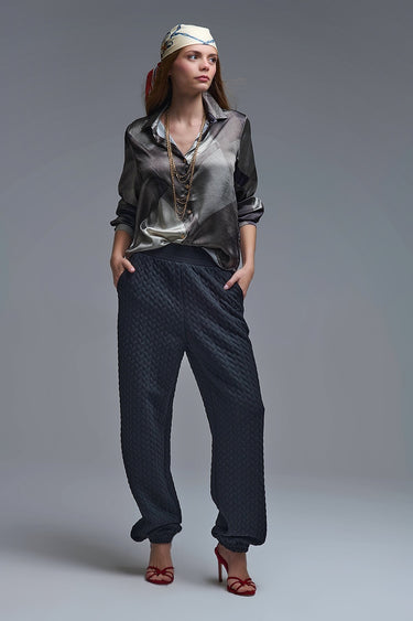 Silky abstract-print button-down shirt in layered grey tones, shown on model with relaxed fit and long sleeves — Verena Shirt by Matte.