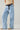 Zaria Jeans angled side view displaying fluid wide-leg silhouette
