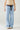 Zaria Jeans front view showing relaxed wide-leg fit and light-wash denim