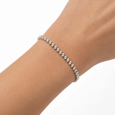 Zarik Bracelet elegant silver tennis bracelet styled on wrist with delicate everyday jewelry look